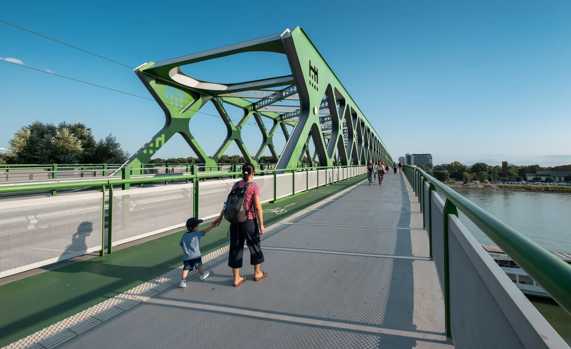 Walking across the rebuilt Starý most (Old Bridge) over the Danube in Bratislava